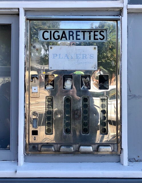Antique cigarette machine